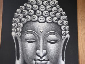 Silver Buddha on Lace Texture