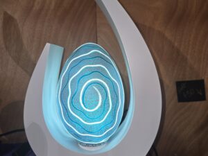 White hook with blue egg